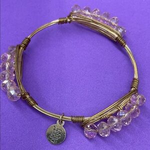 Bourbon and Bowties Gold Wire Bangle with Pale Pink Crystal Beads